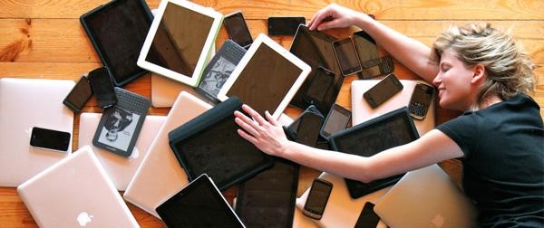Person using multiple devices simultaneously